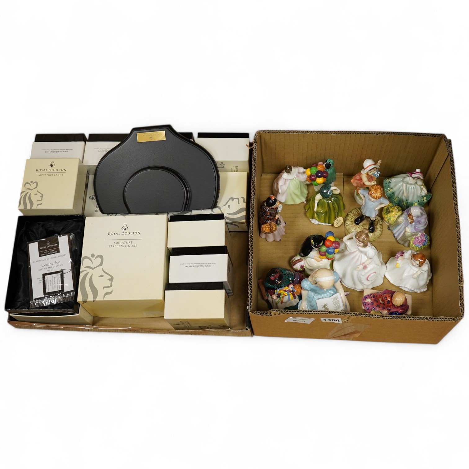 A collection of Royal Doulton figures Beatrix Potter character figures and boxed miniature figures. (2)